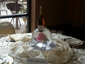 Globe floral bottle holder